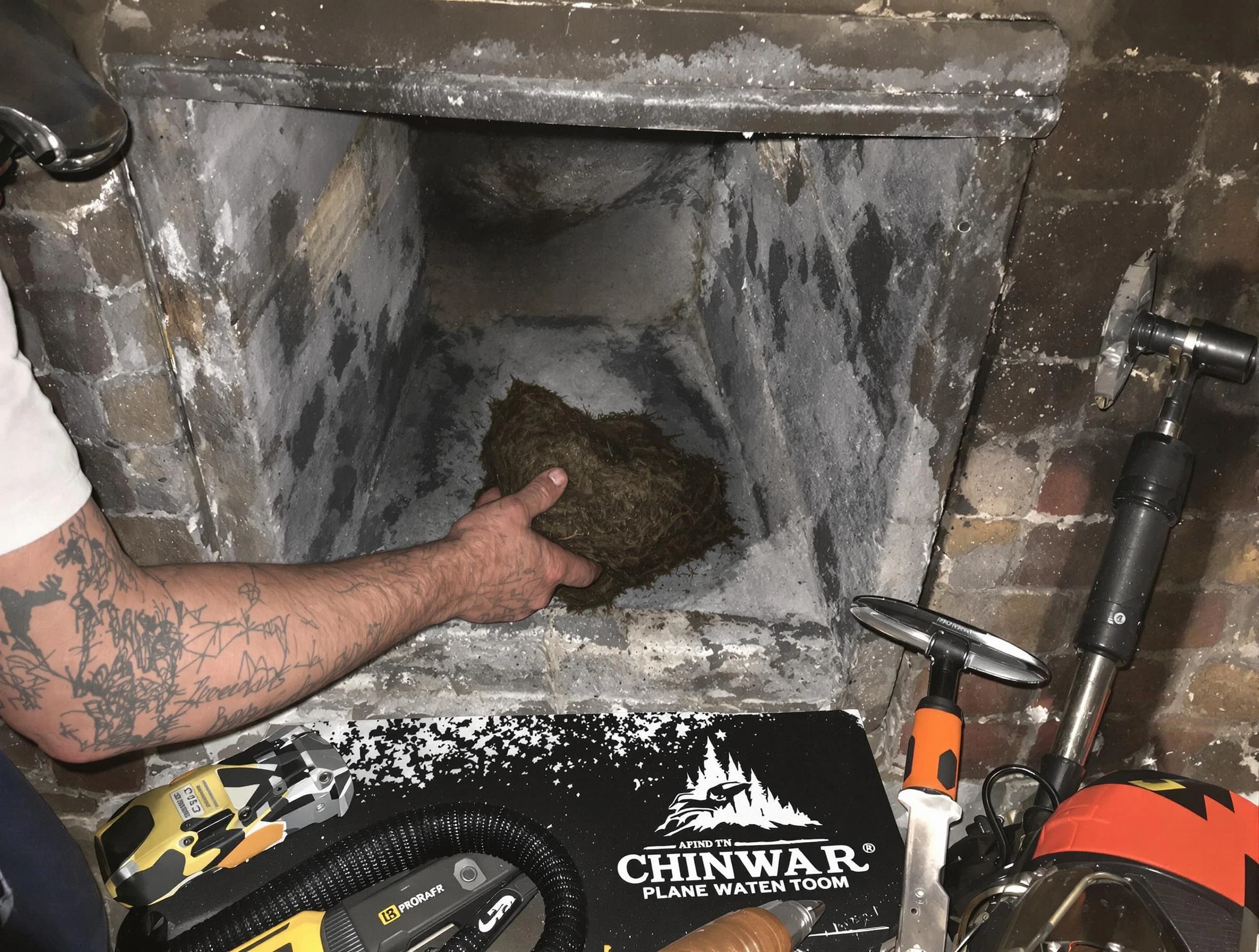 Glendale Chimney Sweep safely removing debris and screening chimney in Glendale, CO